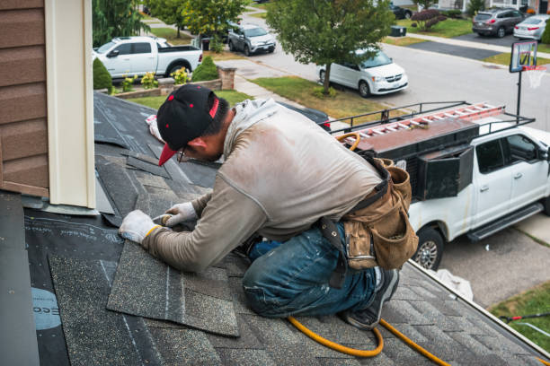 Professional Roofing technician working in Huston, ID
